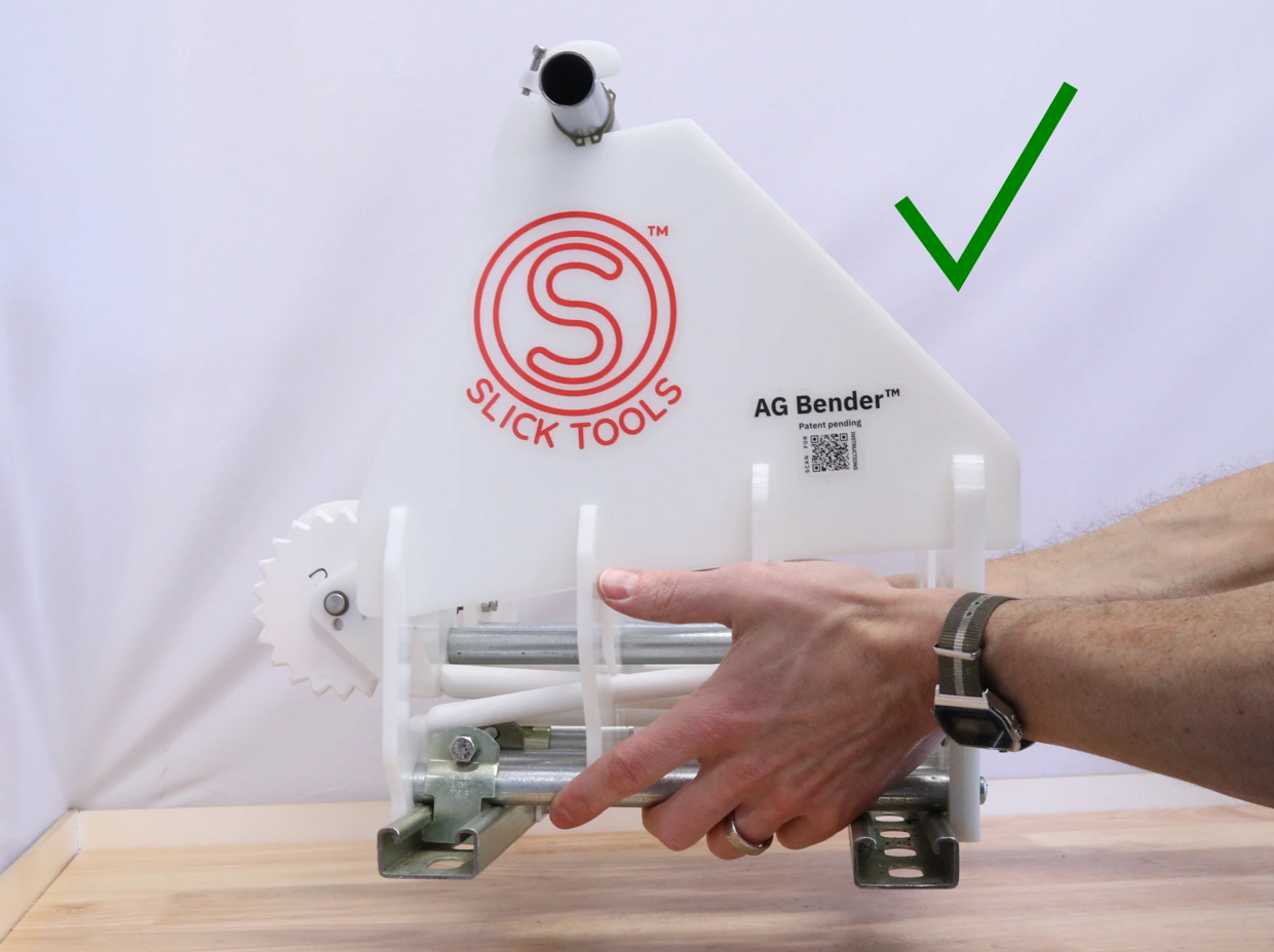 Hold your Slick Tools LLC AG Bender like this.