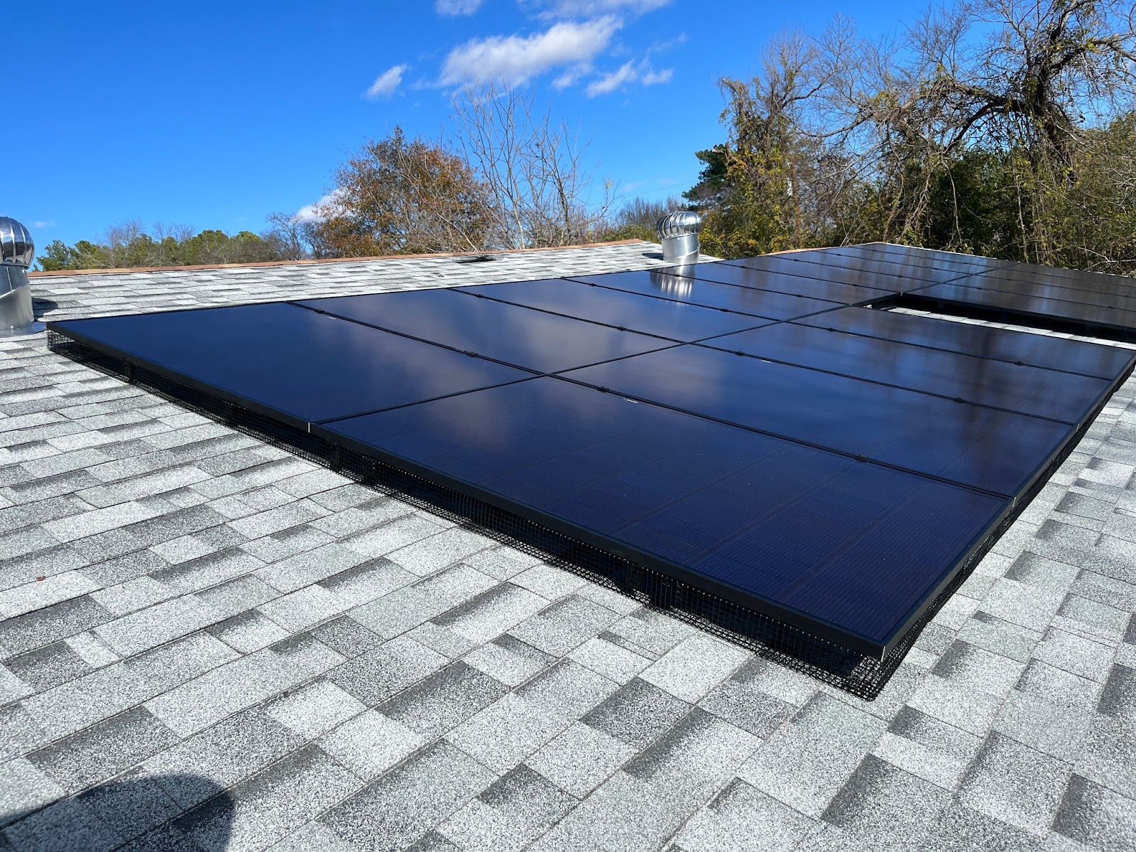 Roof top solar installation job with flush cut rails