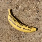 A banana with sharpie written on it