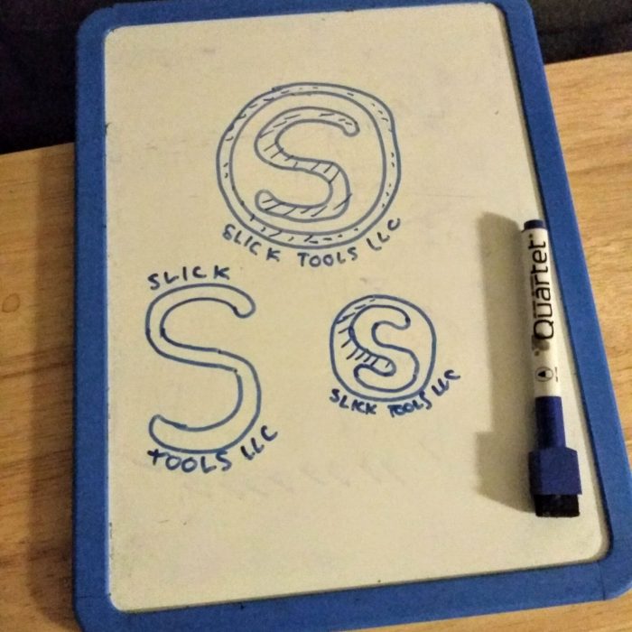 initial sketch of slick tools logo