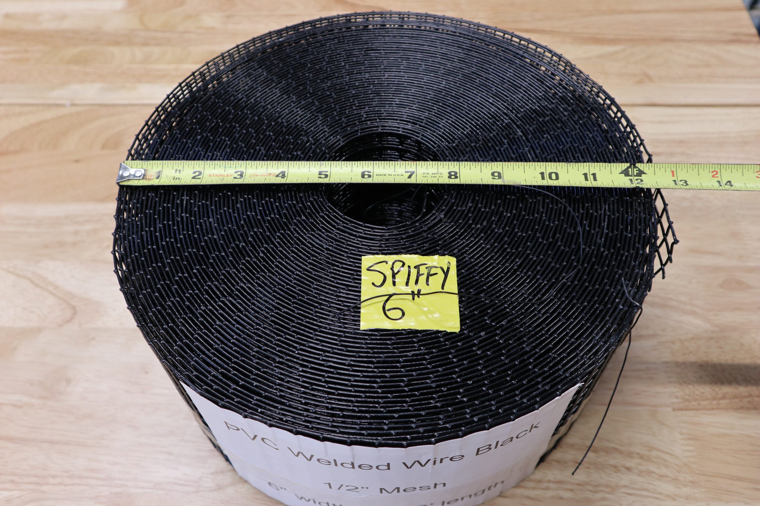 spiffy mesh spool with tape measure showing diameter